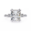White Gold Three Stone Radiant Cut Diamond Ring with Hidden Halo and Pavé Shoulders