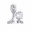 White Gold Pear and Round Cut Diamond Toi et Moi Ring with Pavé Band