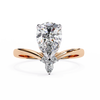 Rose Gold Pear Cut Diamond Ring with Chevron Band and Accent Cluster