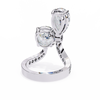 White Gold Pear and Round Cut Diamond Toi et Moi Ring with Pavé Band