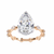 Rose Gold Pear Cut Diamond Ring with Hidden Halo and Spaced Round Eternity Band