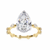 Yellow Gold Pear Cut Diamond Ring with Hidden Halo and Spaced Round Eternity Accents