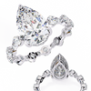 White Gold Pear Cut Diamond Ring with Hidden Halo and Shared-Prong Eternity Accents