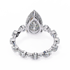 White Gold Pear Cut Diamond Ring with Hidden Halo and Shared-Prong Eternity Accents