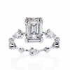 White Gold Emerald Cut Diamond Ring with Pear and Round Eternity Accents