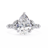 White Gold Pear Cut Diamond Ring with Marquise and Round Eternity Band