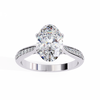 White Gold Oval Cut Diamond Ring with Channel-Framed Pavé Shoulders