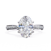White Gold Oval Cut Diamond Ring with Channel-Framed Pavé Shoulders