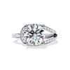 Oval-shaped Diamond with Curvy Halo Band Ring