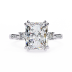 White Gold Three Stone Radiant Cut Diamond Ring with Hidden Halo and Pavé Shoulders