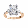 Rose Gold Radiant Cut Diamond Ring with Round Side Stones and Pavé Shoulders
