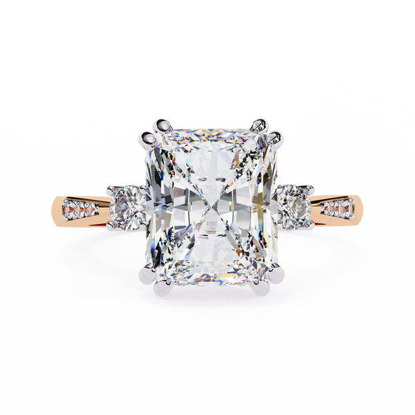 Rose Gold Radiant Cut Diamond Ring with Round Side Stones and Pavé Shoulders