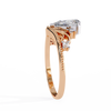 Rose Gold Pear Cut Diamond Crown Ring with Scrollwork and Beaded Band