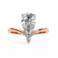 Rose Gold Pear Cut Diamond Ring with Chevron Band and Accent Cluster