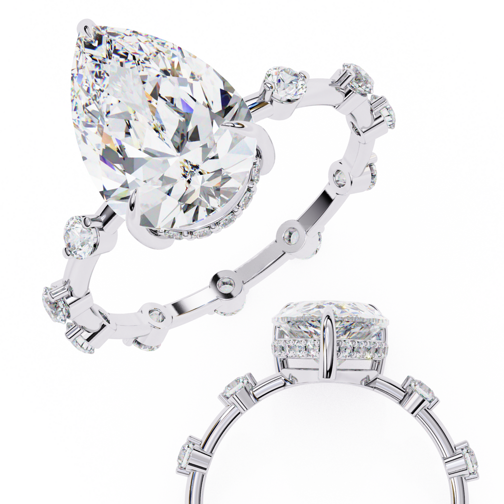 White Gold Pear Cut Diamond Ring with Hidden Halo and Spaced Round Eternity Accents