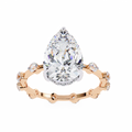 Rose Gold Pear Cut Diamond Ring with Hidden Halo and Spaced Round Eternity Band