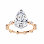 Rose Gold Pear Cut Diamond Ring with Hidden Halo and Spaced Round Eternity Band