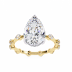 Yellow Gold Pear Cut Diamond Ring with Hidden Halo and Spaced Round Eternity Accents