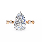 Rose Gold Pear Cut Diamond Ring with Hidden Halo and Spaced Round Eternity Band