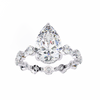 White Gold Pear Cut Diamond Ring with Hidden Halo and Shared-Prong Eternity Accents