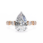 Rose Gold Pear Cut Diamond Ring with Round Eternity Band and Hidden Halo
