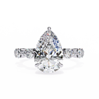 White Gold Pear Cut Diamond Ring with Hidden Halo and Shared-Prong Eternity Accents