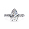 White Gold Pear Cut Diamond Ring with Hidden Halo and Shared-Prong Eternity Accents
