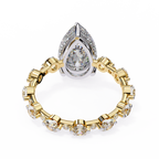 Yellow Gold Pear Cut Diamond Ring with Hidden Halo and Shared-Prong Eternity Accents