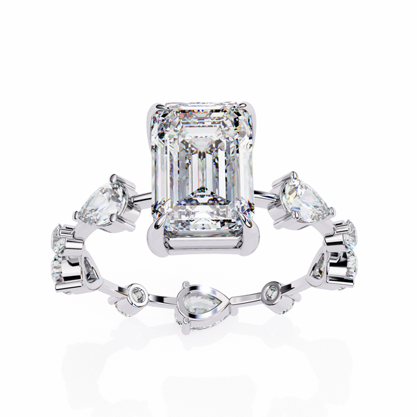 White Gold Emerald Cut Diamond Ring with Pear and Round Eternity Accents