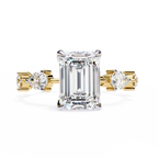 Yellow Gold Emerald Cut Diamond Ring with Pear and Round Eternity Accents