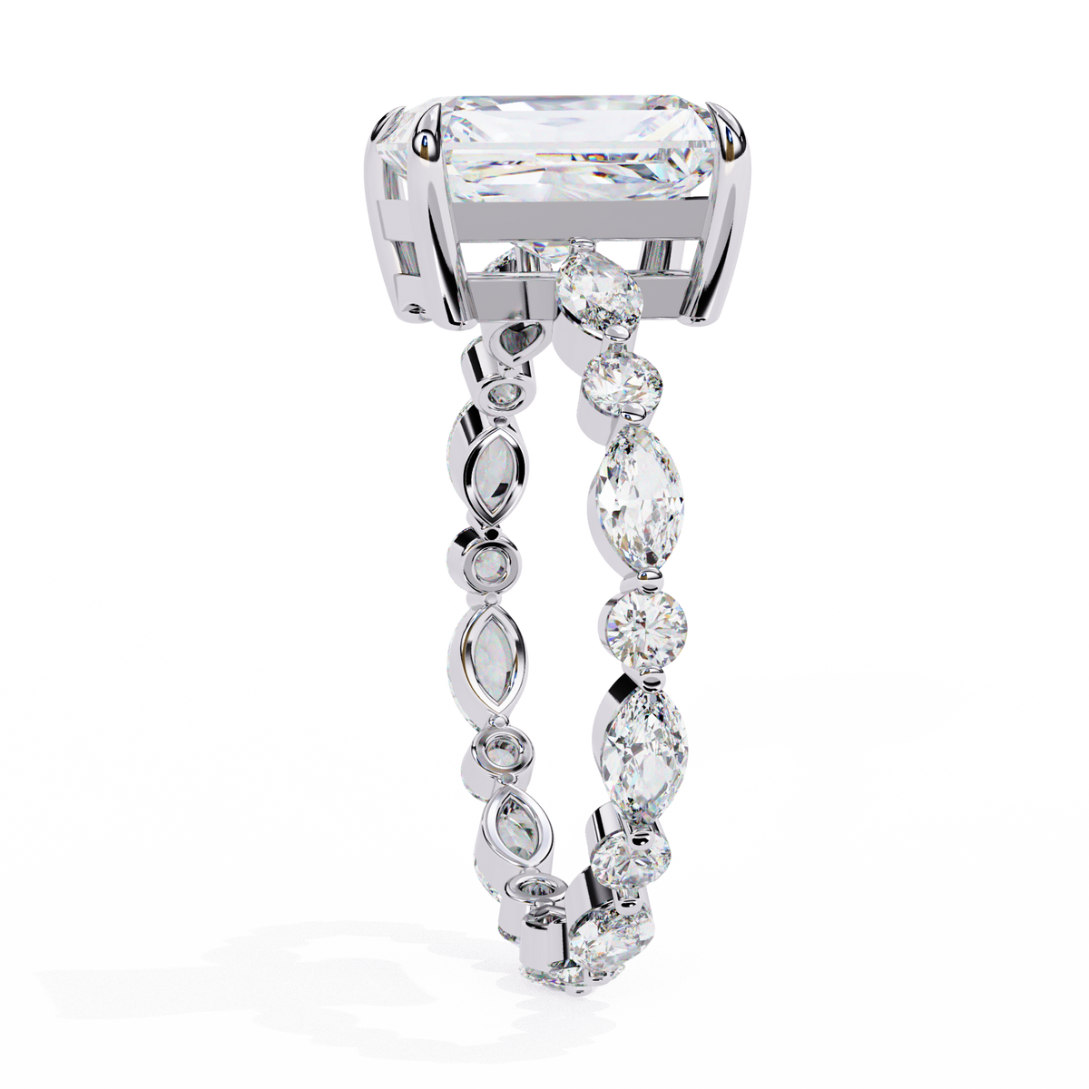White Gold Radiant Cut Diamond Ring with Pear and Round Accents