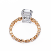 Rose Gold Radiant Cut Diamond Ring with Pear and Round Accent Band