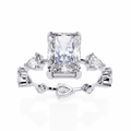 White Gold Radiant Cut Diamond Ring with Pear Eternity Band