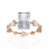 Rose Gold Radiant Cut Diamond Ring with Pear Eternity Band