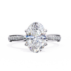White Gold Oval Cut Diamond Ring with Channel-Framed Pavé Shoulders