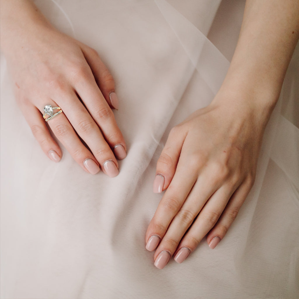 Gold Pear Diamond East-West Crossover Ring