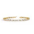 Yellow Gold Emerald and Round Cut Tennis Bracelet