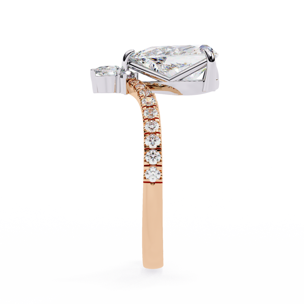 Rose Gold Pear Cut Diamond Crown Ring with Marquise Accent and Pavé Chevron Band