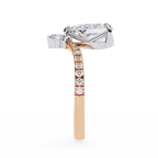 Rose Gold Pear Cut Diamond Crown Ring with Marquise Accent and Pavé Chevron Band
