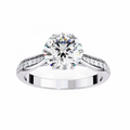 White Gold Round Brilliant Diamond Ring with Channel Pavé Shoulders