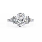 White Gold Oval Cut Diamond Cluster Ring with Marquise and Round Side Stones