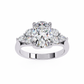 White Gold Oval Cut Diamond Cluster Ring with Marquise and Round Side Stones