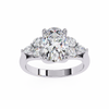 White Gold Oval Cut Diamond Cluster Ring with Marquise and Round Side Stones