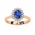 Rose Gold Oval Blue Sapphire Ring with Diamond Halo