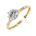Gold Round Diamond Solitaire Ring with Scattered Accent Diamonds