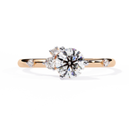 Gold Round Diamond Solitaire Ring with Scattered Accent Diamonds