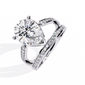 White Gold Pear Cut Diamond Crossover Pavé Ring