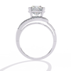 Oval-shaped Diamond with Curvy Halo Band Ring
