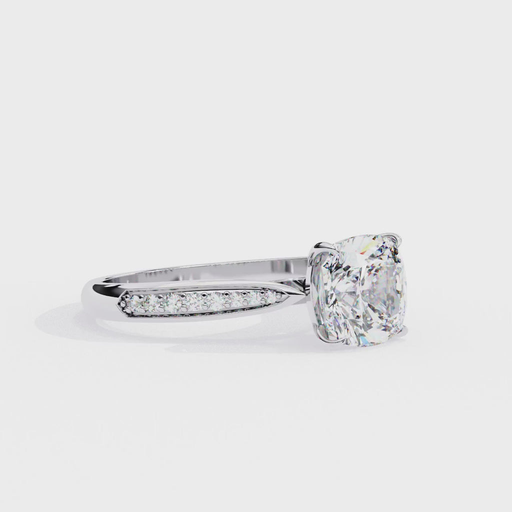 White Gold Cushion Cut Diamond Ring with Channel Pavé Shoulders