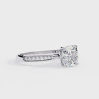White Gold Cushion Cut Diamond Ring with Channel Pavé Shoulders